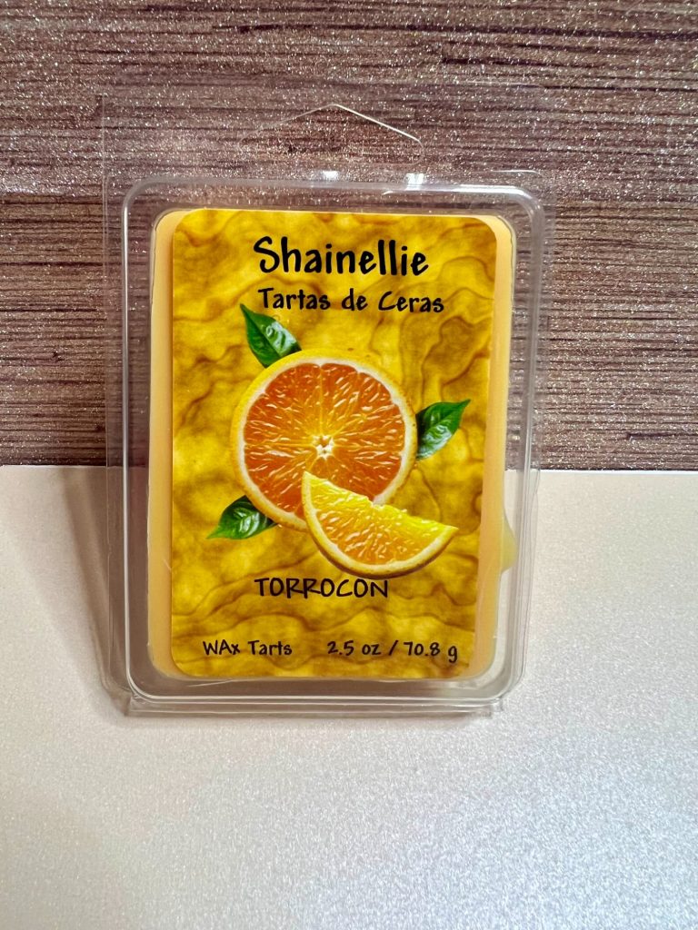 Torrocon Yellow wax melt packaging featuring an orange slice and text information.